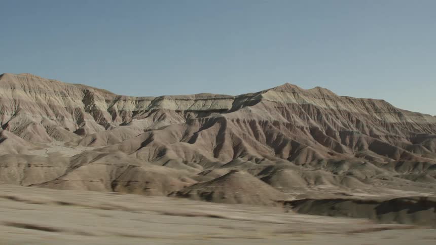 Mountains in the desert badlands under a clear sky