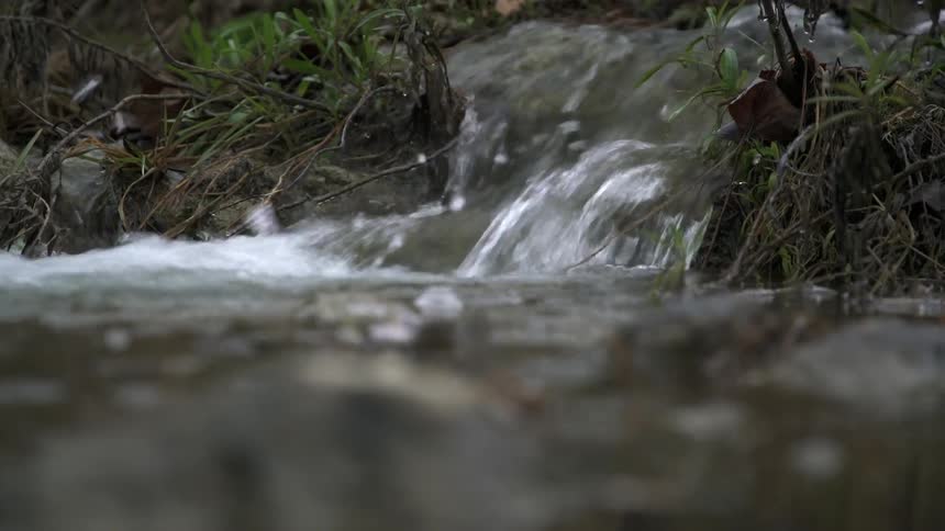 A stream is slowly pouring water