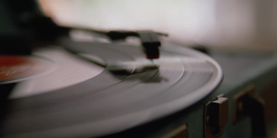 A view of a record that is playing on a record player