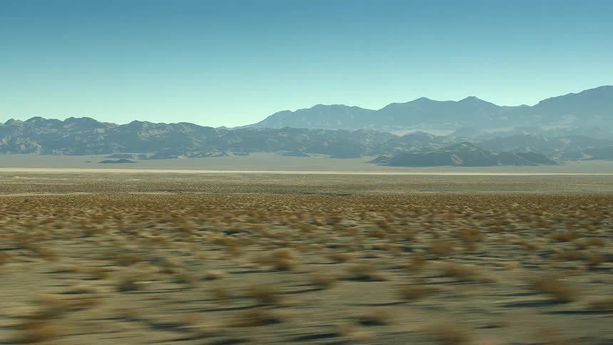 The desert is empty before the mountains