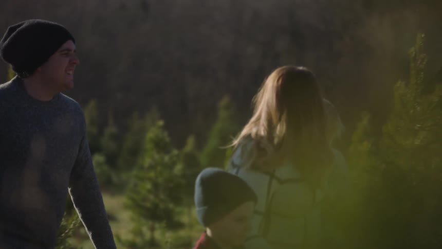 A family all walking together outdoors