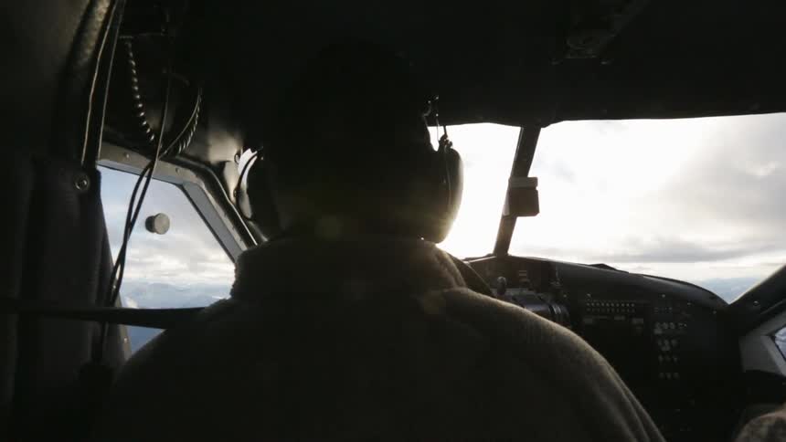 A pilot flies a plane