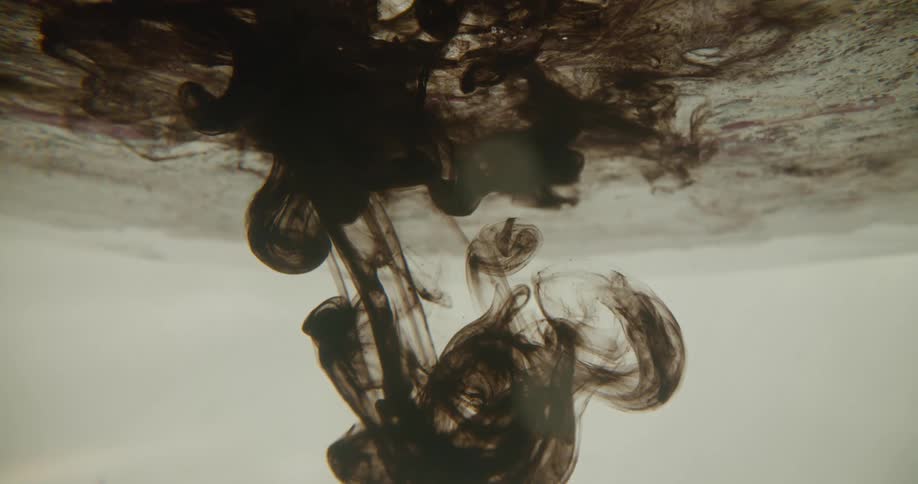 Abstract footage of dye mixing in water