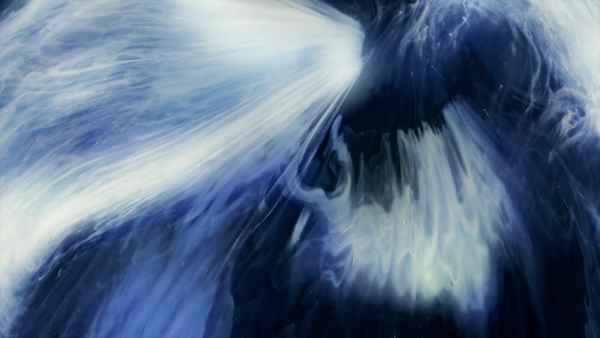 Flowing white and blue liquid