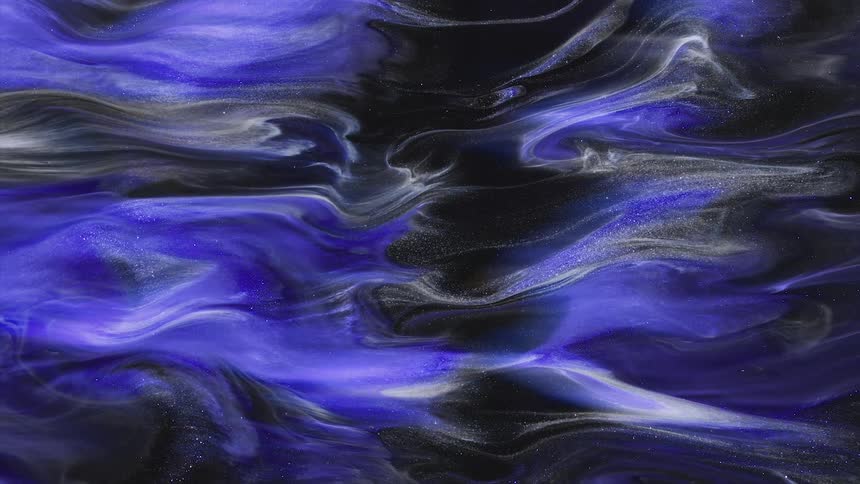 Waves and streaks of moving waves of bright shimmering colorful blue ripples black and white ink