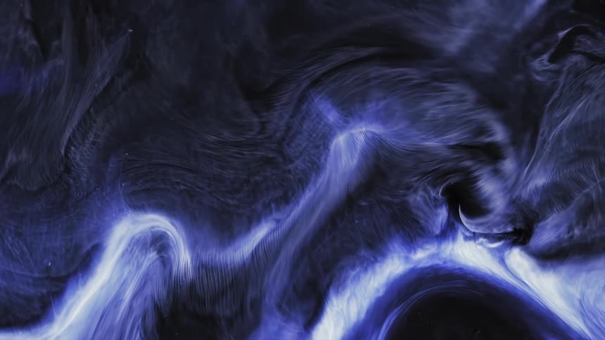 Flowing black and purple liquid