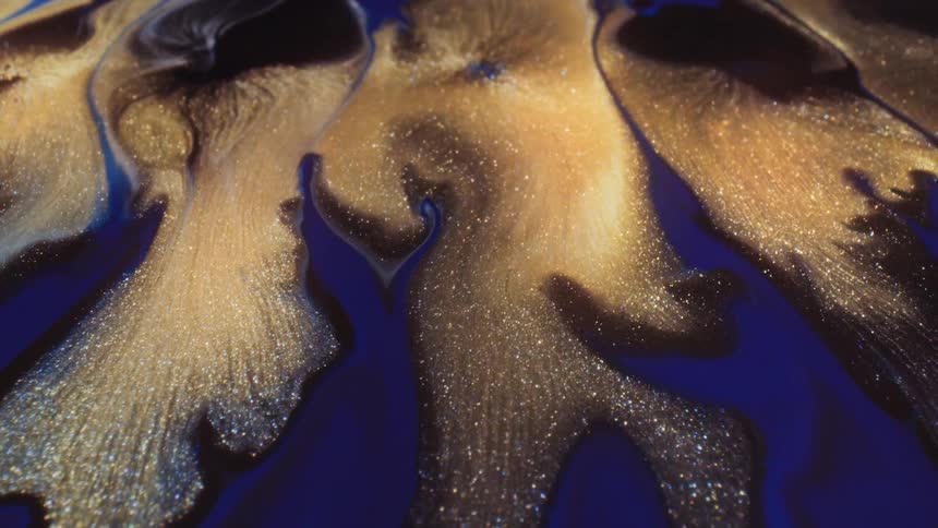 golden streams of glitter expand with a complex texture and beautiful details