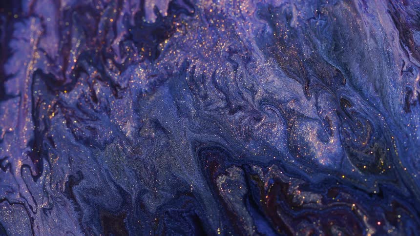 purple and iridescent liquid moving like a fluid artwork