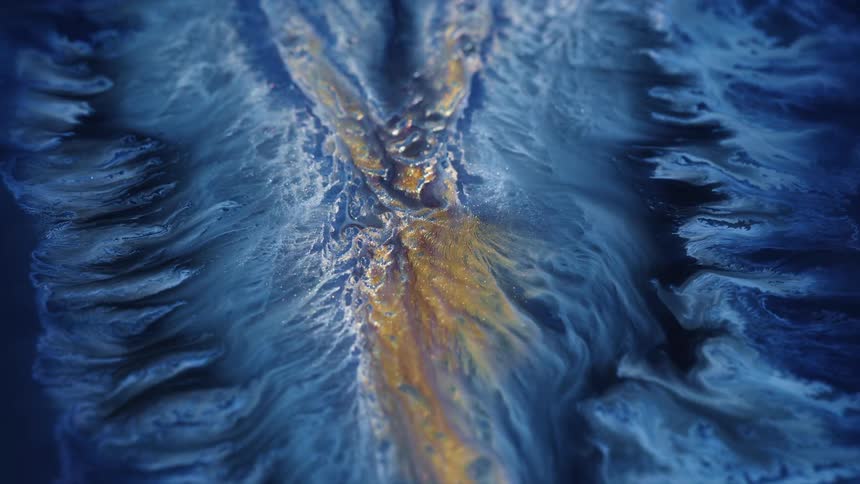 An abstract macro landscape of rivers in gold and blue