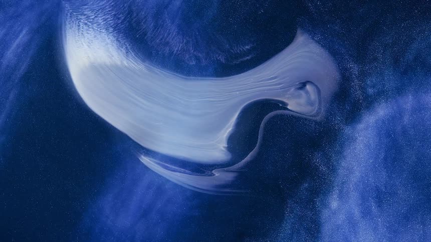 White blue and gray colors that look like water and sand