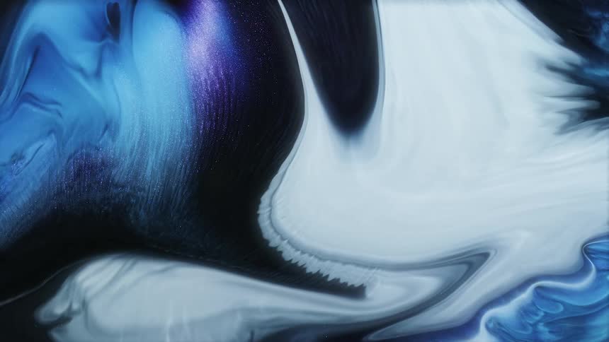 Shimmering waves and traces of expanding electric blue and black ink
