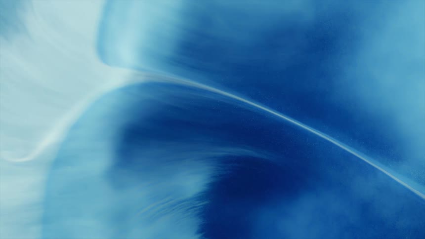 Shimmering waves and traces of expanding bright electric blue and black ink