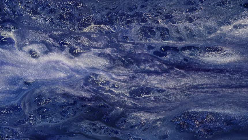 Digital artwork is made to appear like moving ocean water