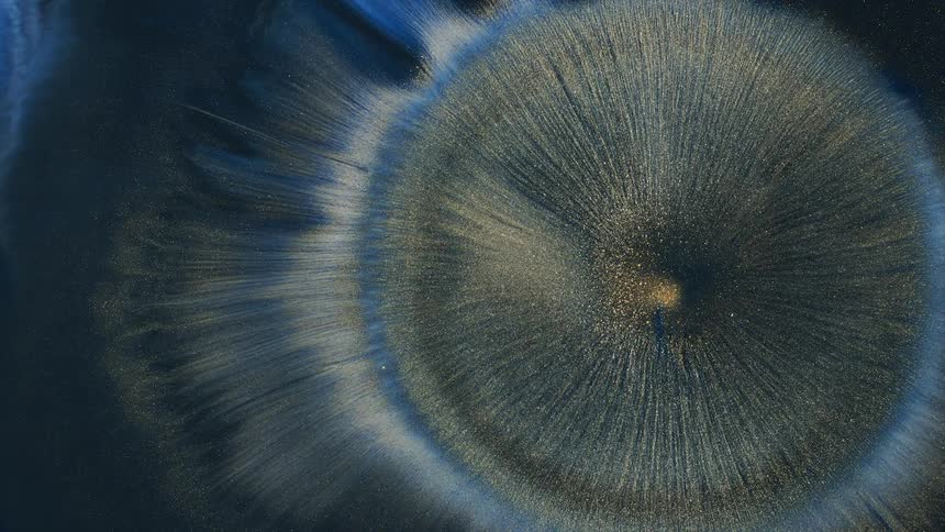 A view of gold and blue colors exploding out