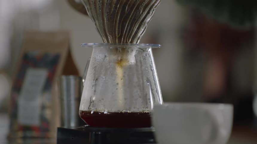Coffee is being brewed using a pour over
