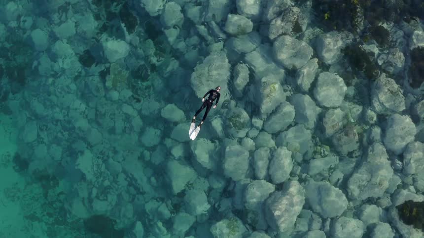 A man snorkeling in the ocean