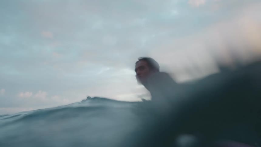 A man surfing outdoors in the ocean