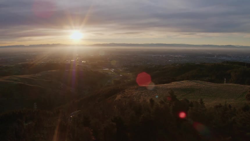 A wide shot of a landscape in the morning