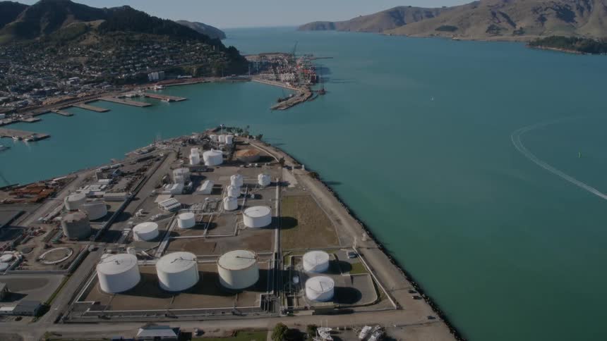 An aerial shot of a town by the water