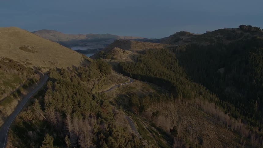 An aerial view of some mountains during the day