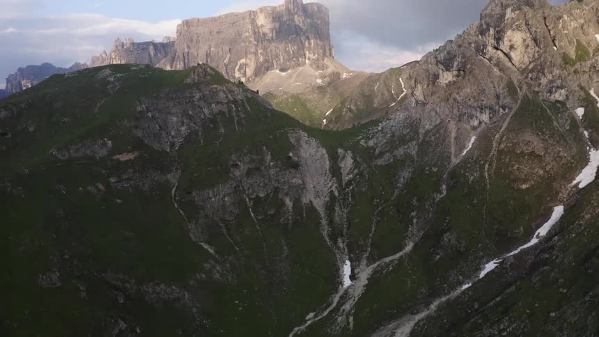 An aerial view of a mountain range and valleys