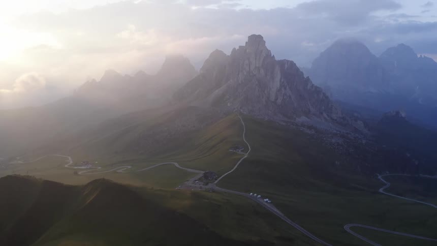 An aerial view of some mountains in the distance