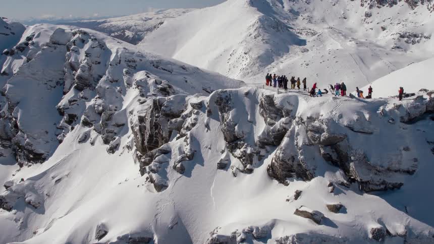 People on top of a snow covered mountain