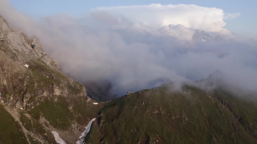 Aerial view of mountains in winter are displayed