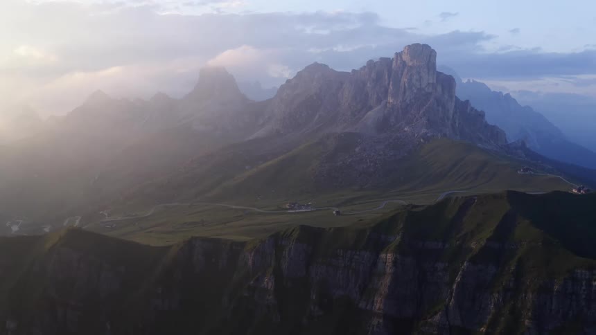 An aerial view of a large mountain range in the morning