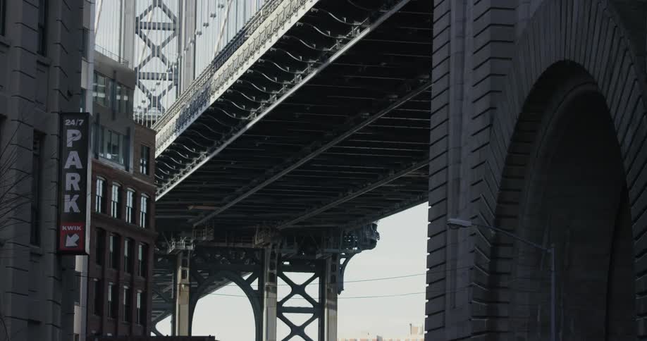 A bridge sits near a building
