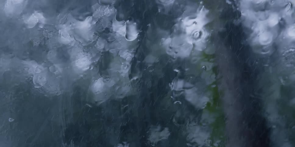 Rain falling on window