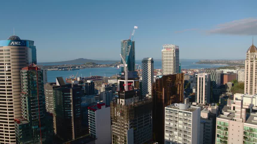 An aerial view of a city with large buildings