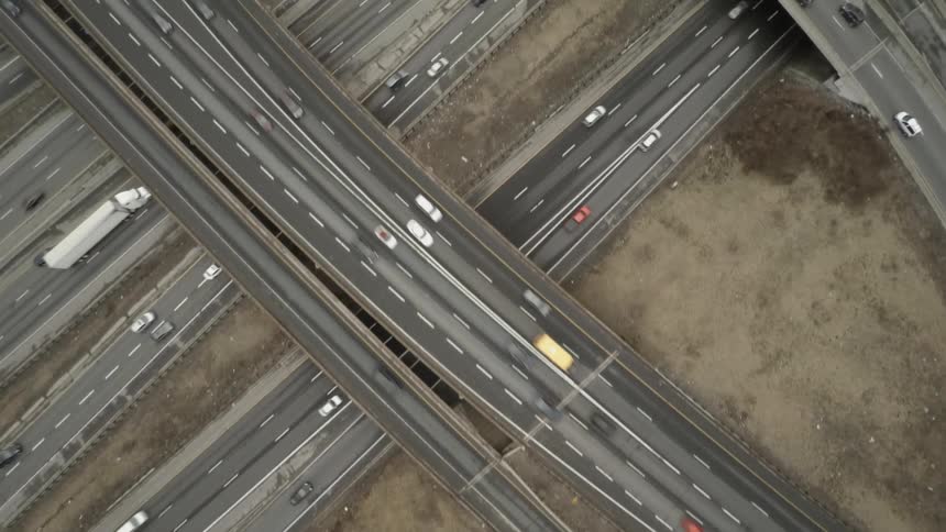 Aerial view of a busy intersection with overpasses