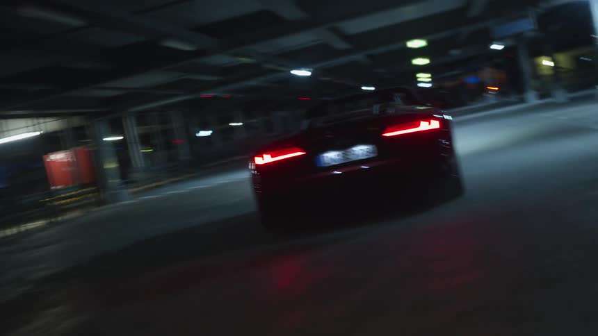 Car travels in an underground parking lot