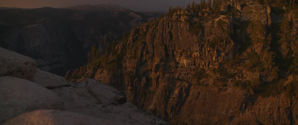The sun is rising over the mountains