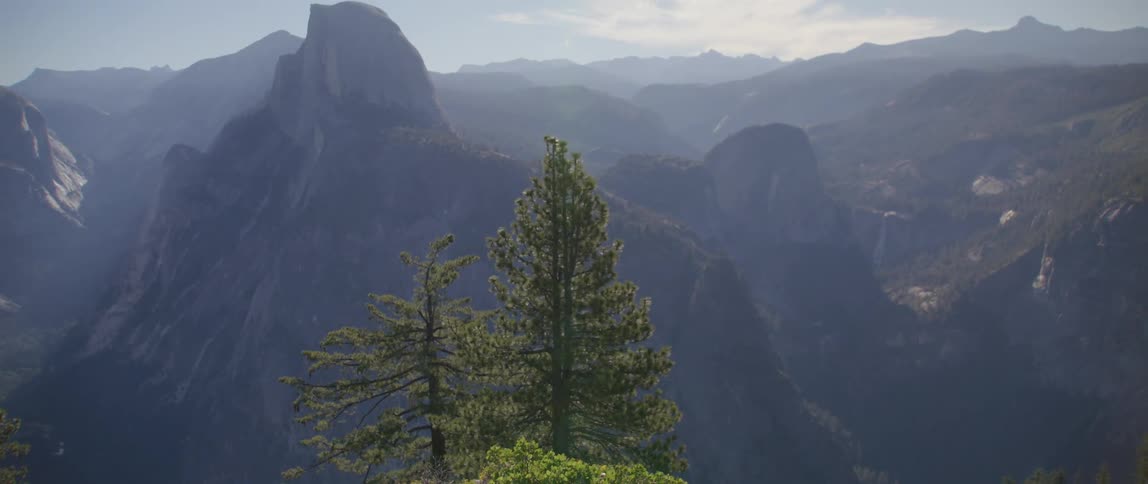 An aerial view of a canyon and mountains