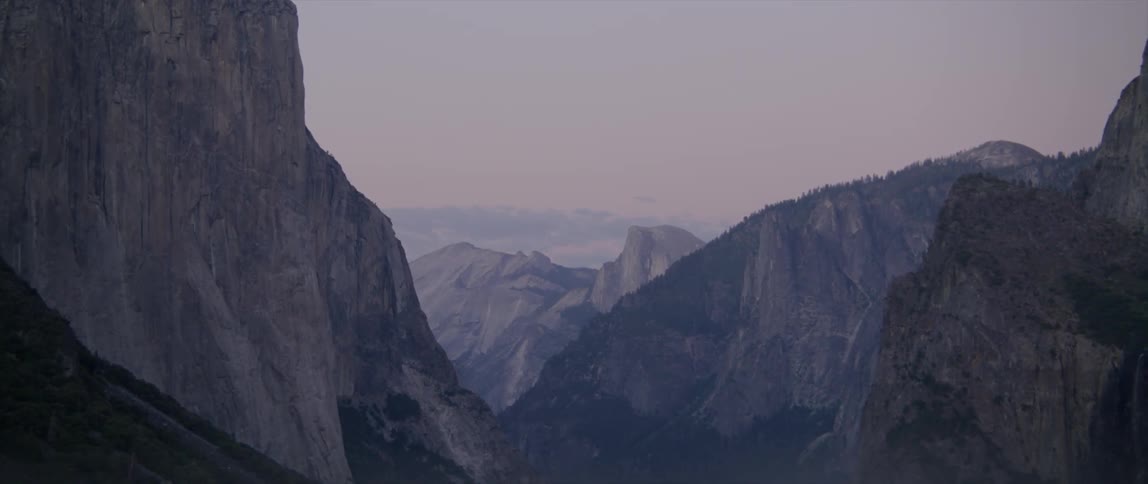 Mountain range under a hazy sky