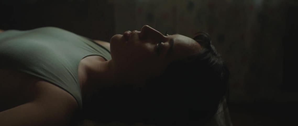 A woman laying in a bed