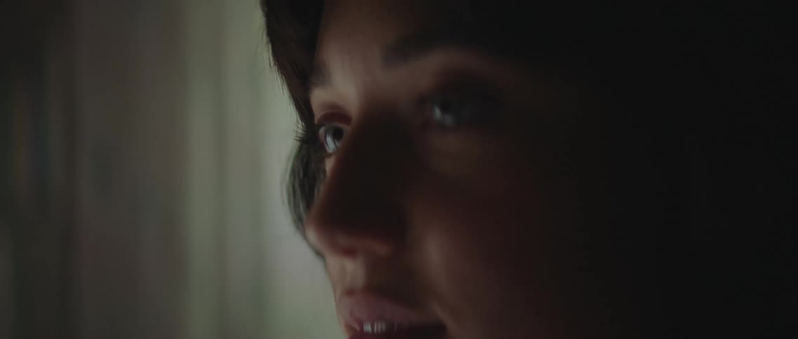 A woman looking into a mirror