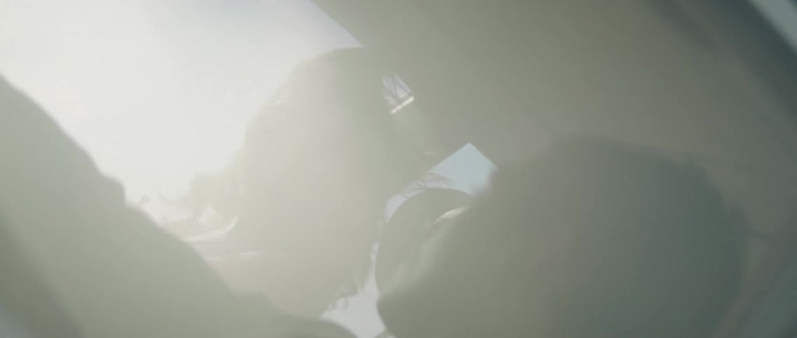 The fog rolls around inside of the moving vehicle