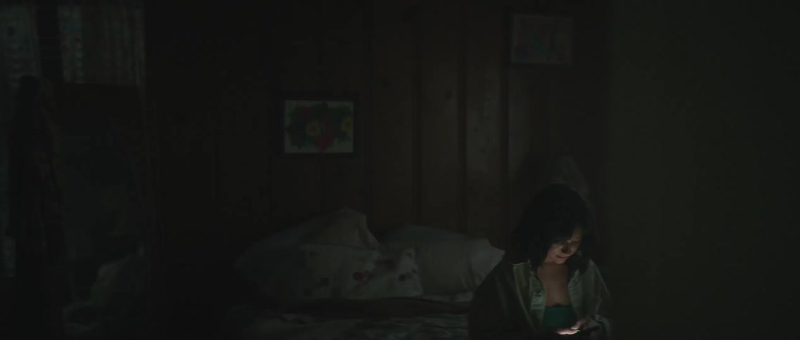 Woman typing on phone