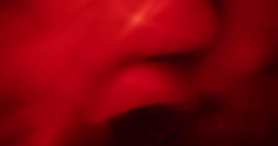 Small clusters come out of holes in a red blob