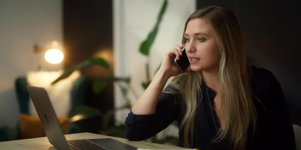 A woman talking on a phone