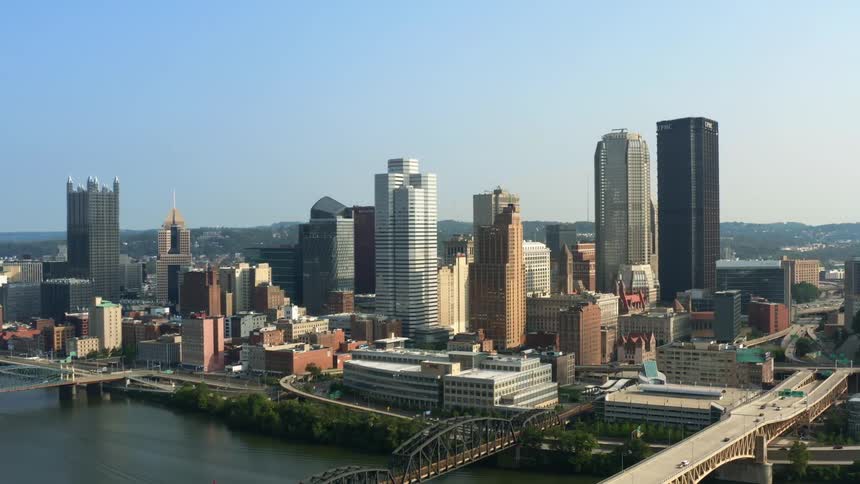Buildings and tall skyscrapers in a city on a clear day