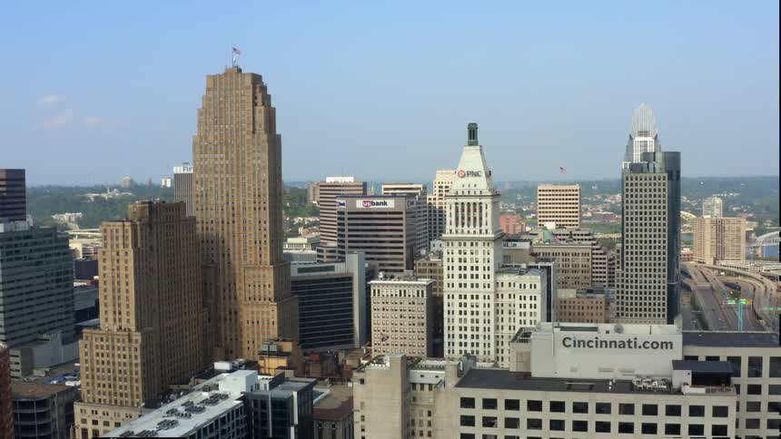An aerial view of tall skyscrapers in cincinnati in the daytime
