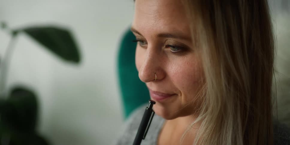 A woman sitting in an office