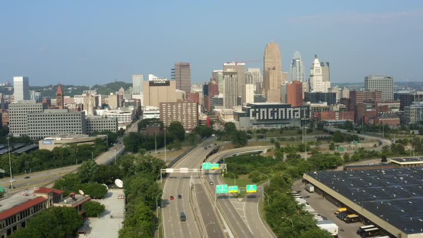 An aerial view of a lot of buildings in a city