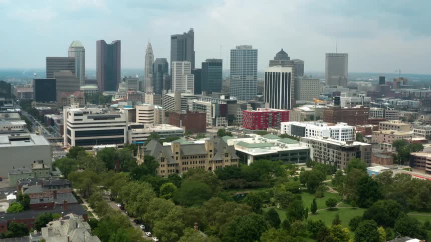 An aerial view of buildings and skyscrapers in a city