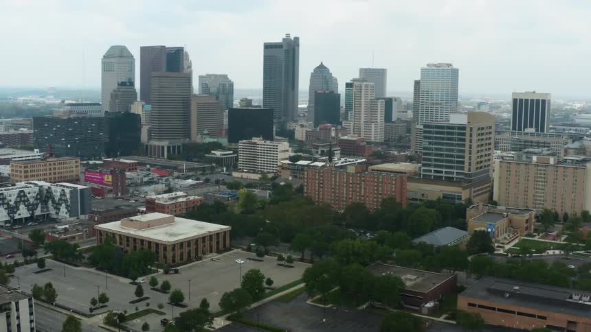 Aerial view of tall skyscrapers in the city downtown skyline at day