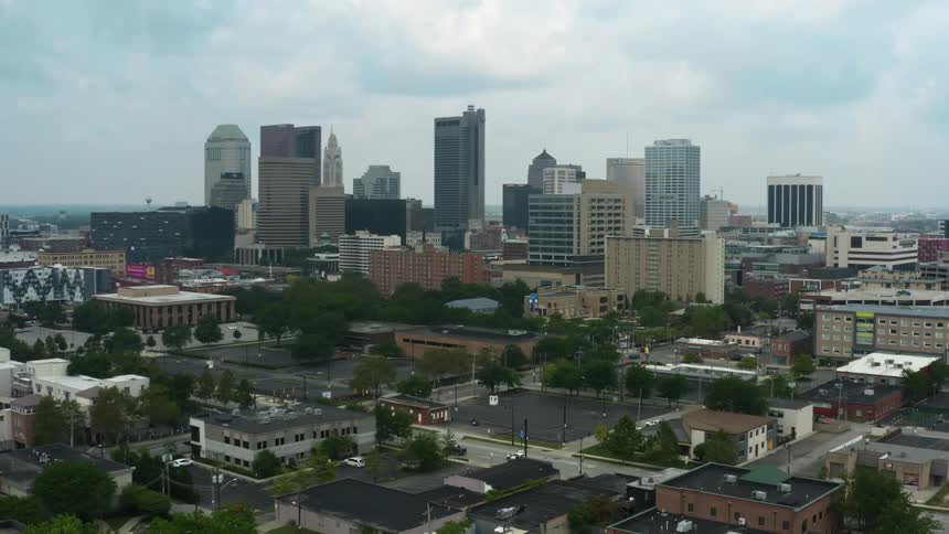 Buildings and sky scrapers in a city on a cloudy day
